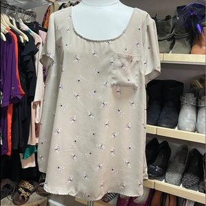 Short sleeve work top with cute little moths.